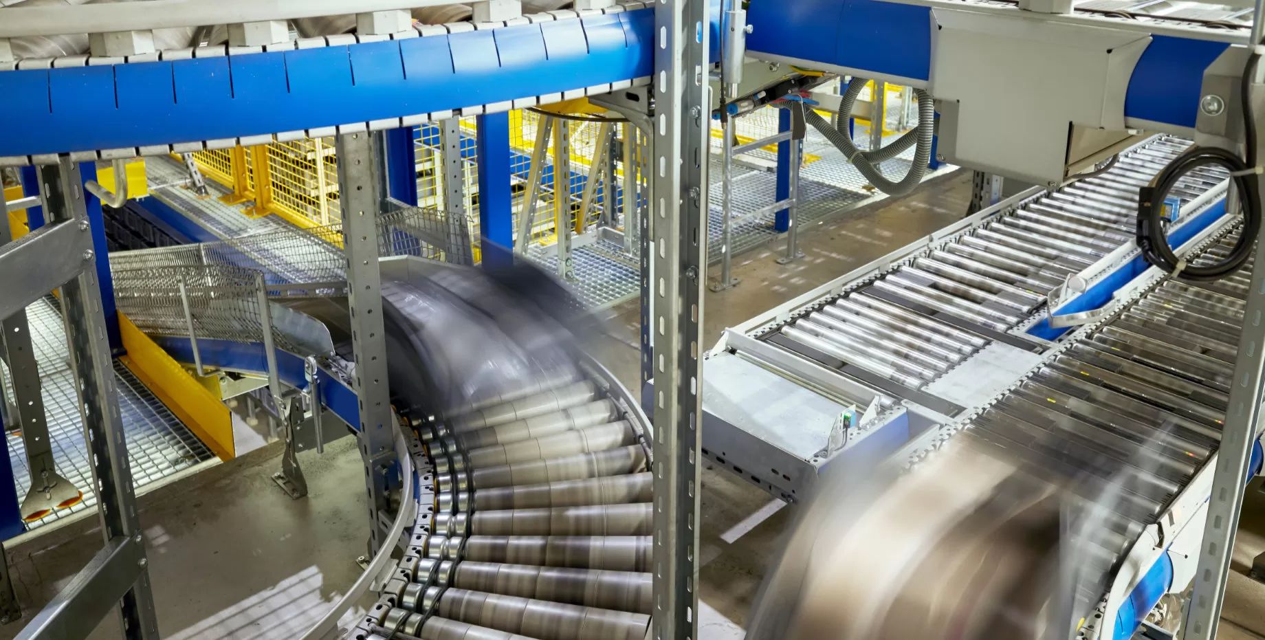 Conveyor system utilizing ES Systems' advanced sensors for industrial automation and smart manufacturing processes.